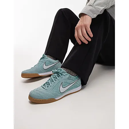 Nike Gato sneakers in light blue for $40.50